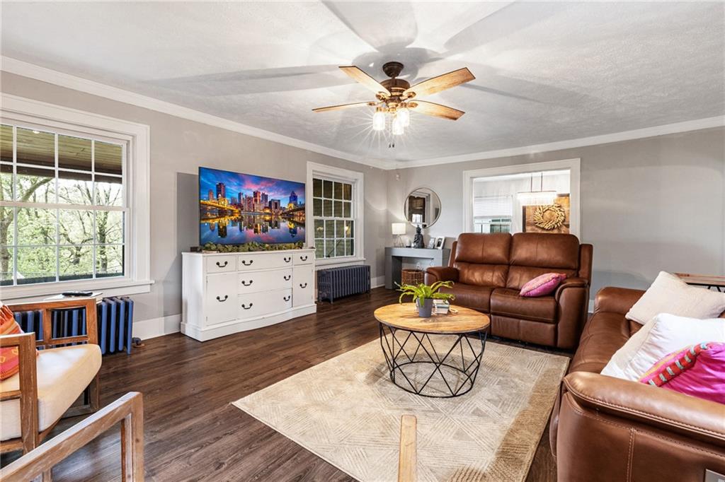 305 7th Street Beaver Falls, PA 15010 - Photo 21 of 37 a living room with furniture and a flat screen tv