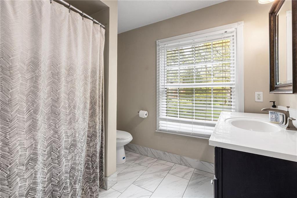 305 7th Street Beaver Falls, PA 15010 - Photo 31 of 37 a bathroom with a sink a toilet and a bathtub