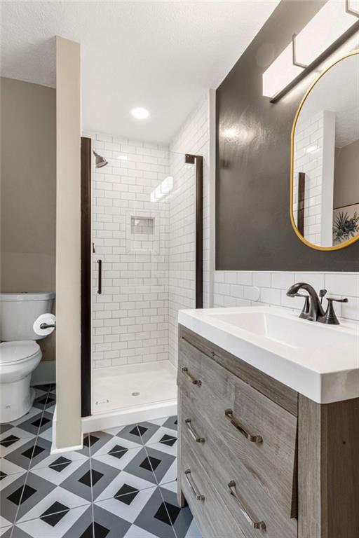 305 7th Street Beaver Falls, PA 15010 - Photo 34 of 37 a bathroom with a sink a toilet and shower