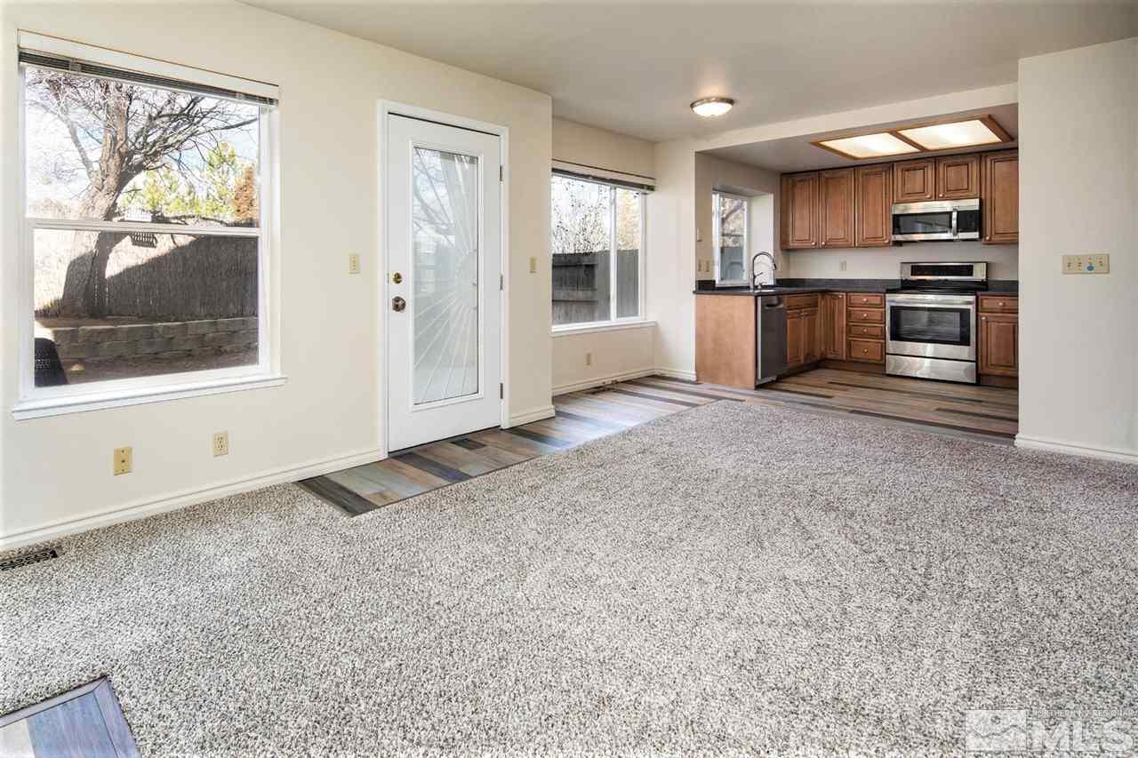 3175 Alpine Creek Road Reno, NV 89519 - Photo 5 of 25 a view of a kitchen with a sink dishwasher and a refrigerator