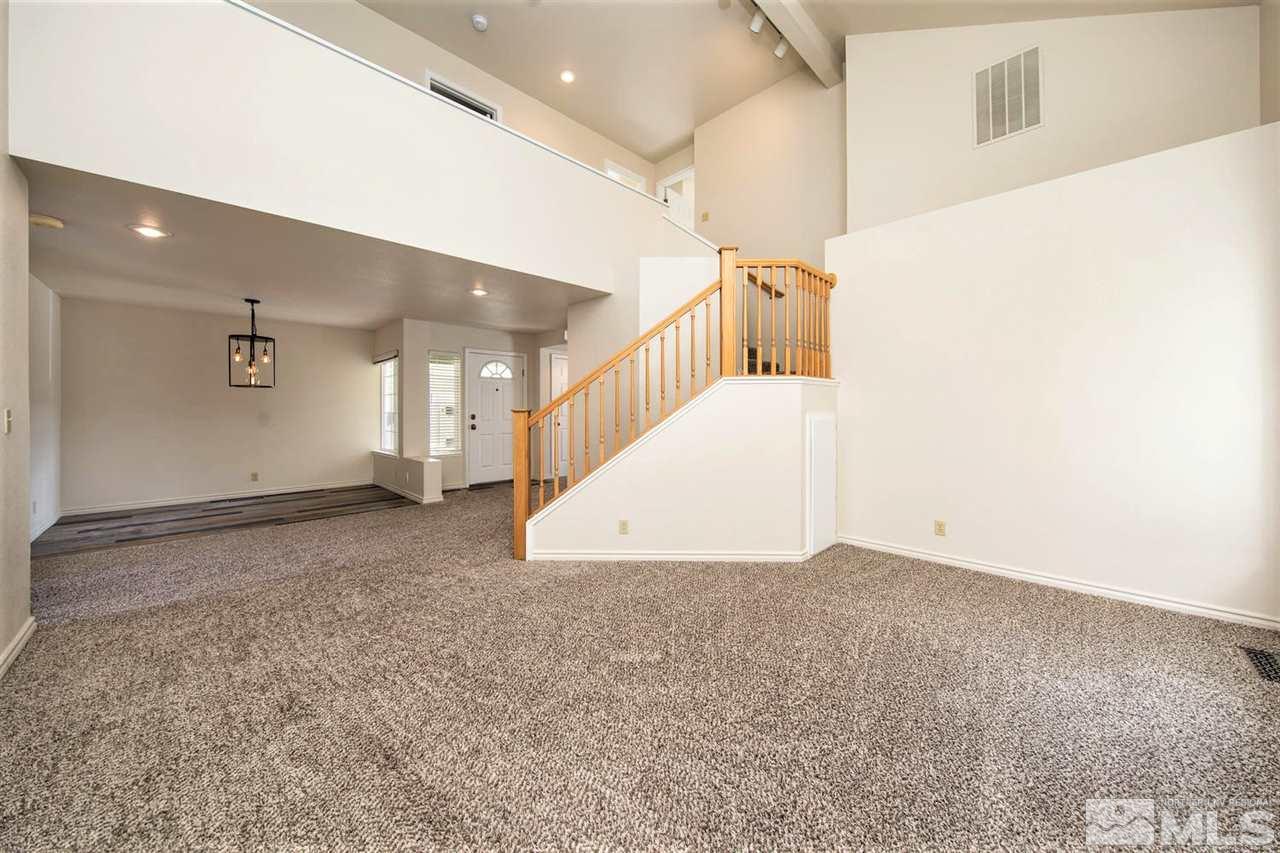 3175 Alpine Creek Road Reno, NV 89519 - Photo 10 of 25 a view of a hallway with staircase