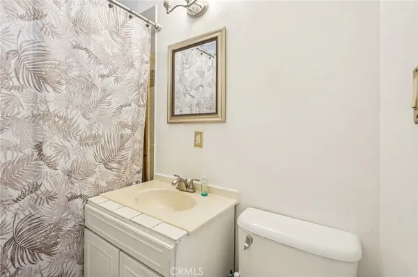 a bathroom with a sink and a toilet