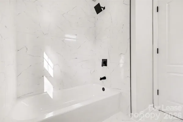 a bathroom with a bathtub
