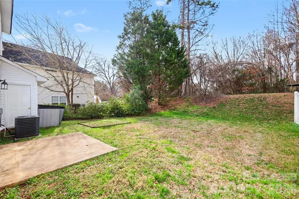a view of a backyard with tree s