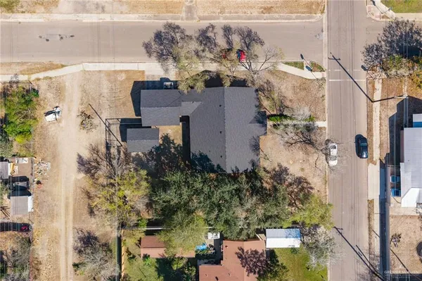 an aerial view of houses with outdoor space