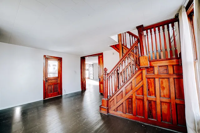 a view of entryway with wooden floor