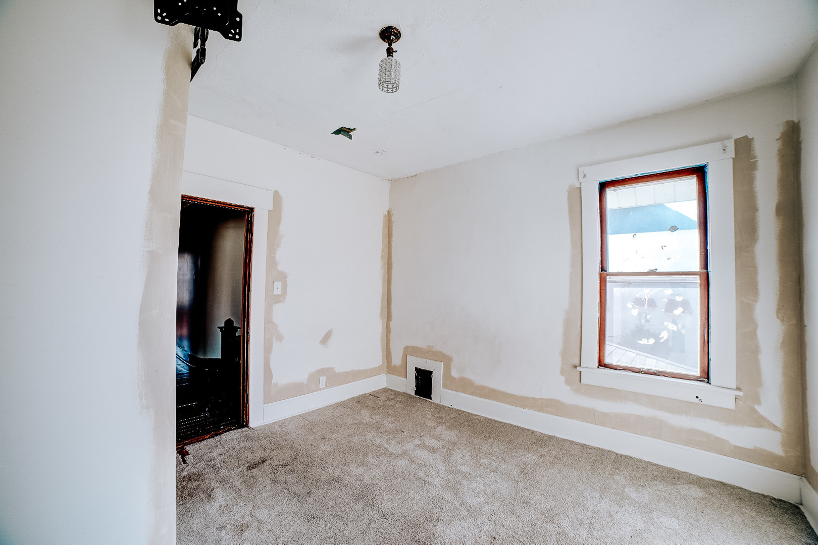 204 North Chicago Street Milford, IL 60953 - Photo 46 of 48 a view of an empty room with a window