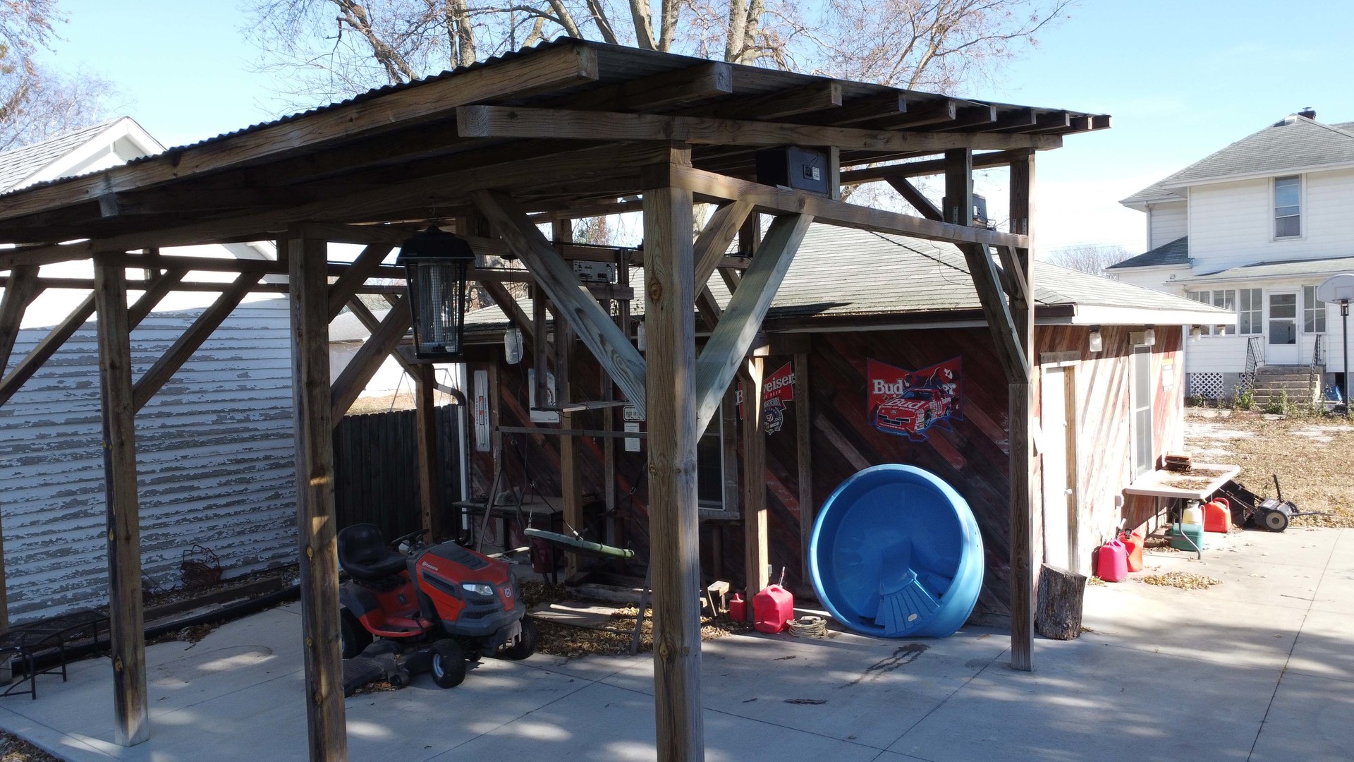 204 North Chicago Street Milford, IL 60953 - Photo 7 of 48 a backyard of a house with table and chairs