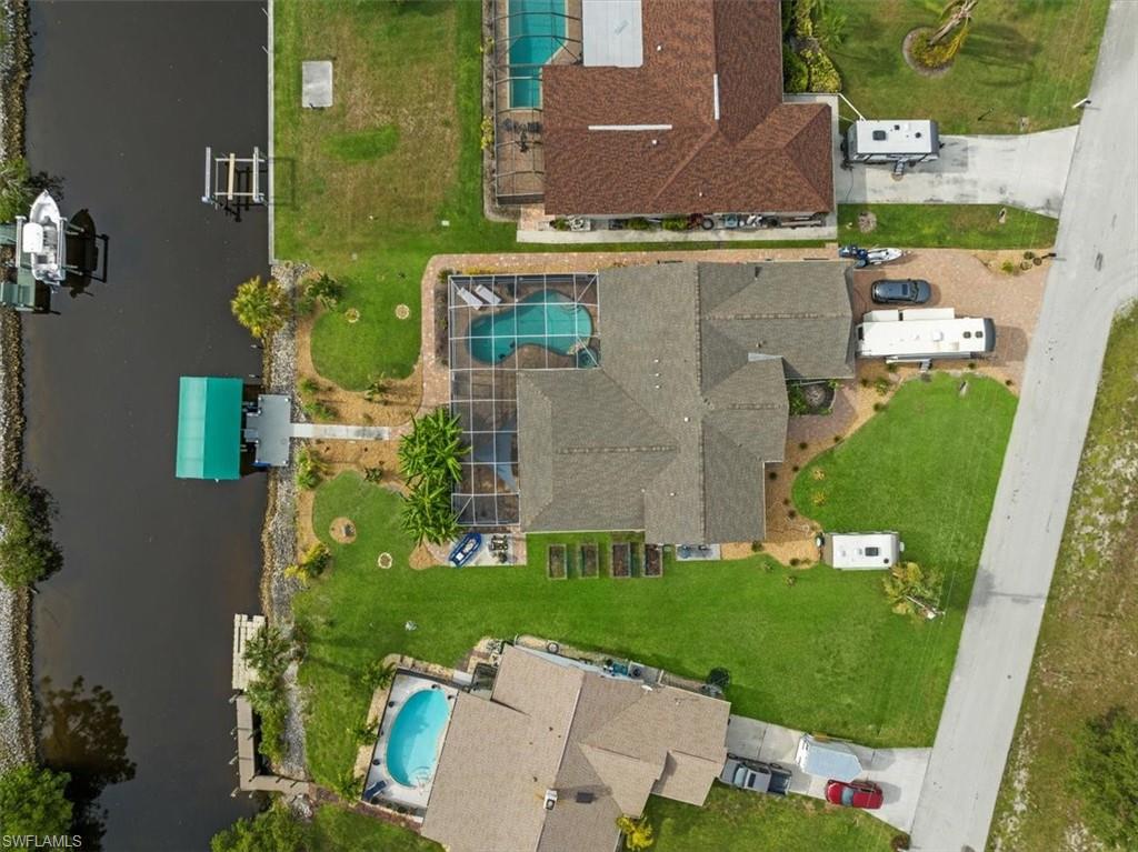20660 Park Place Estero, FL 33928 - Photo 1 of 26 an aerial view of a house with a garden