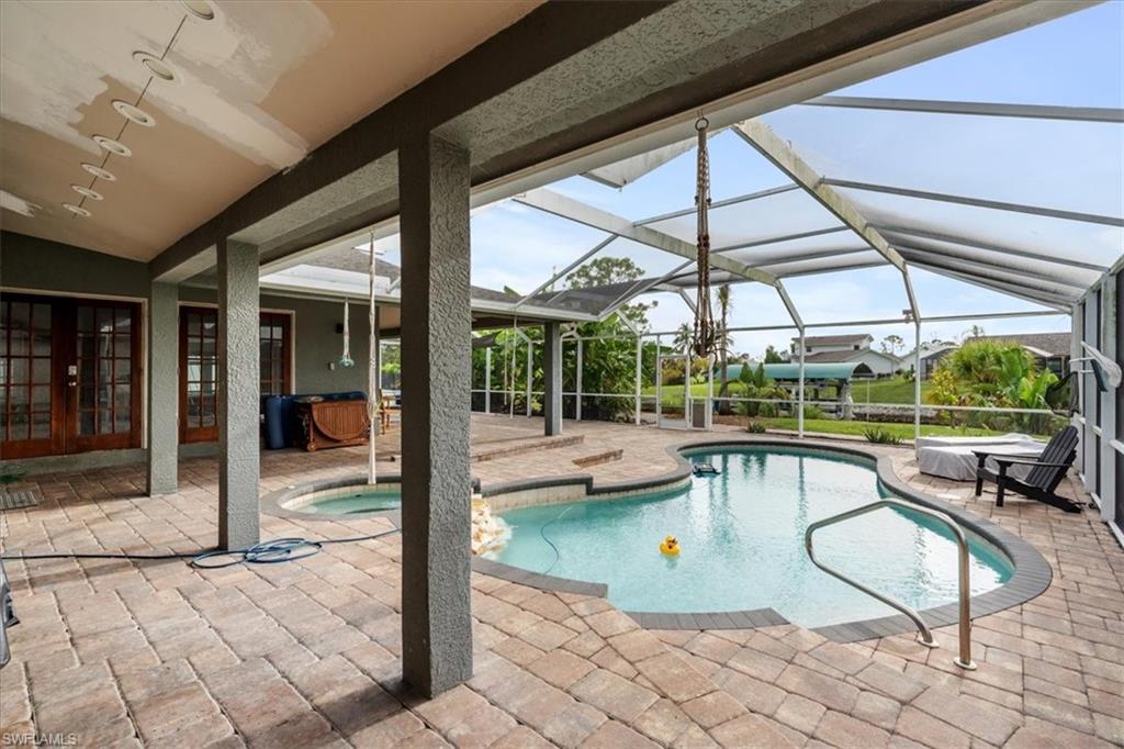 20660 Park Place Estero, FL 33928 - Photo 16 of 26 a view of swimming pool with seating area