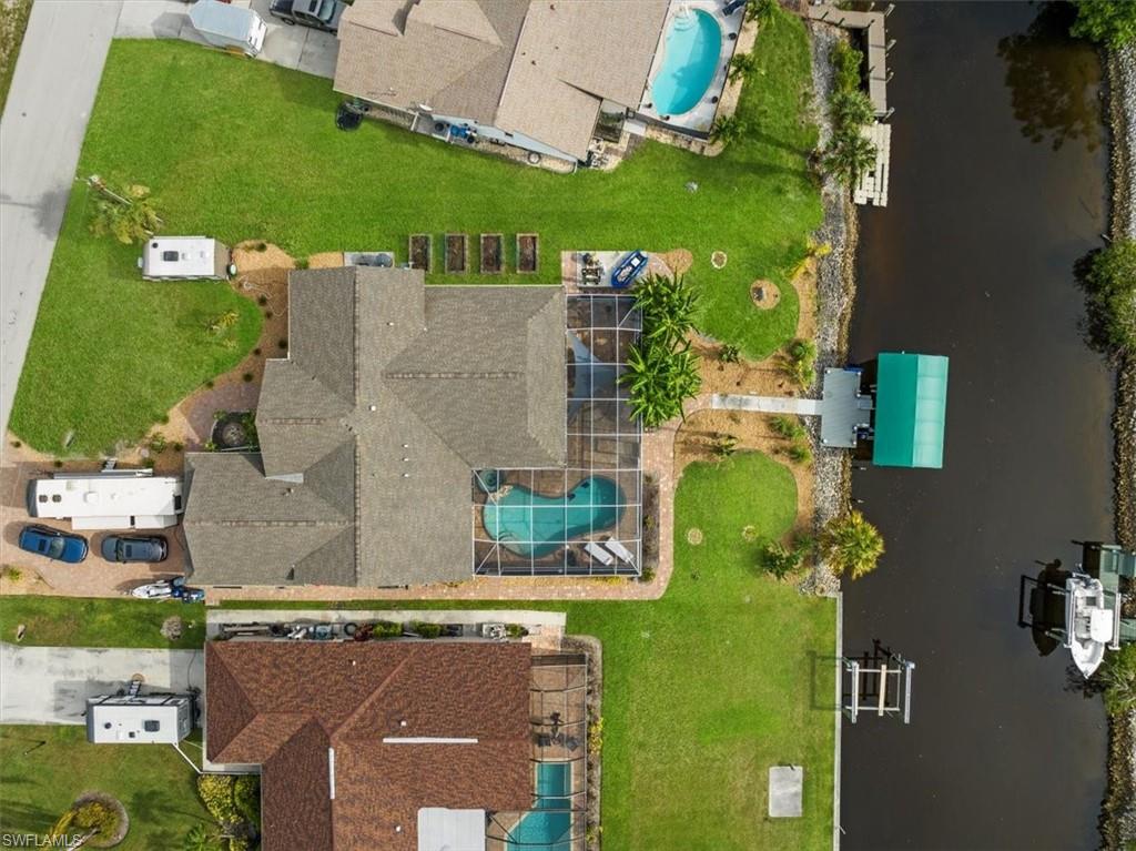 20660 Park Place Estero, FL 33928 - Photo 2 of 26 an aerial view of residential house with outdoor space and swimming pool