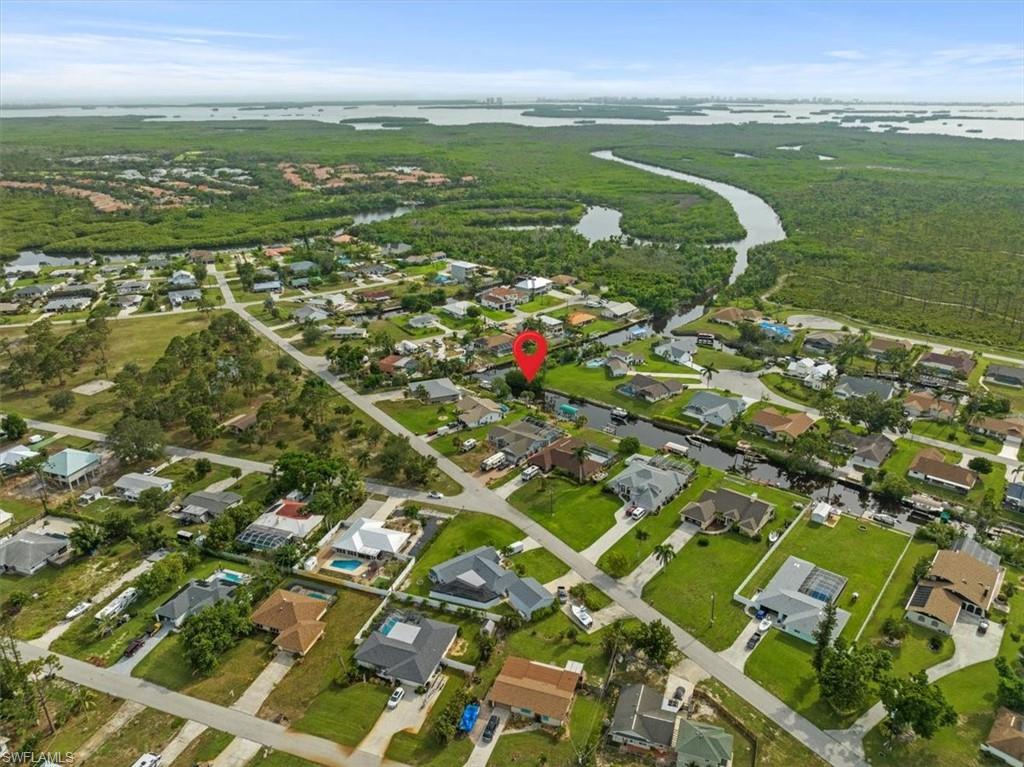 20660 Park Place Estero, FL 33928 - Photo 25 of 26 a view of a city with an ocean