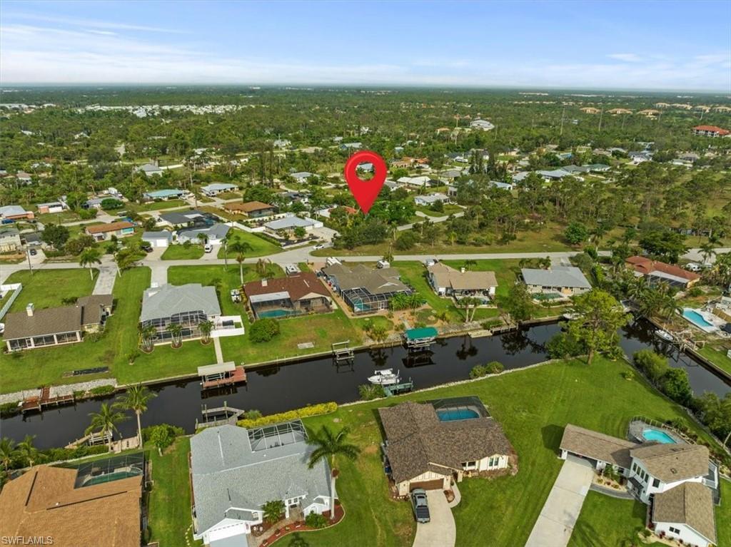 20660 Park Place Estero, FL 33928 - Photo 4 of 26 an aerial view of residential houses with outdoor space and swimming pool