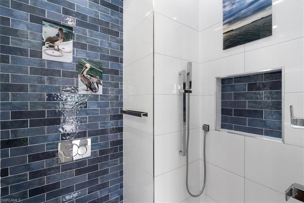 20660 Park Place Estero, FL 33928 - Photo 9 of 26 a bathroom with a shower