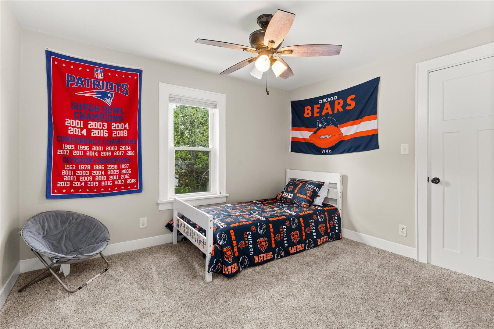 742 Chambers Street Ottawa, IL 61350 - Photo 24 of 39 a bedroom with a bed and a chandelier