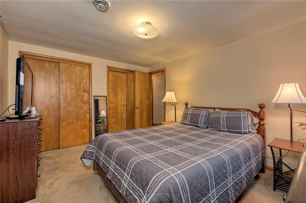 1119 Church Street Indiana, PA 15701 - Photo 15 of 34 a bedroom with a bed and a lamp