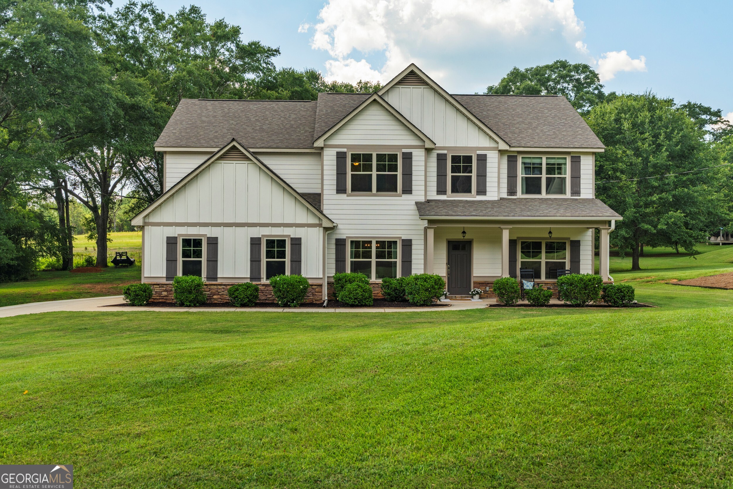 1612 Dennis Smith Road Pine Mountain, GA 31822 - Photo 1 of 33 a front view of a house with a garden