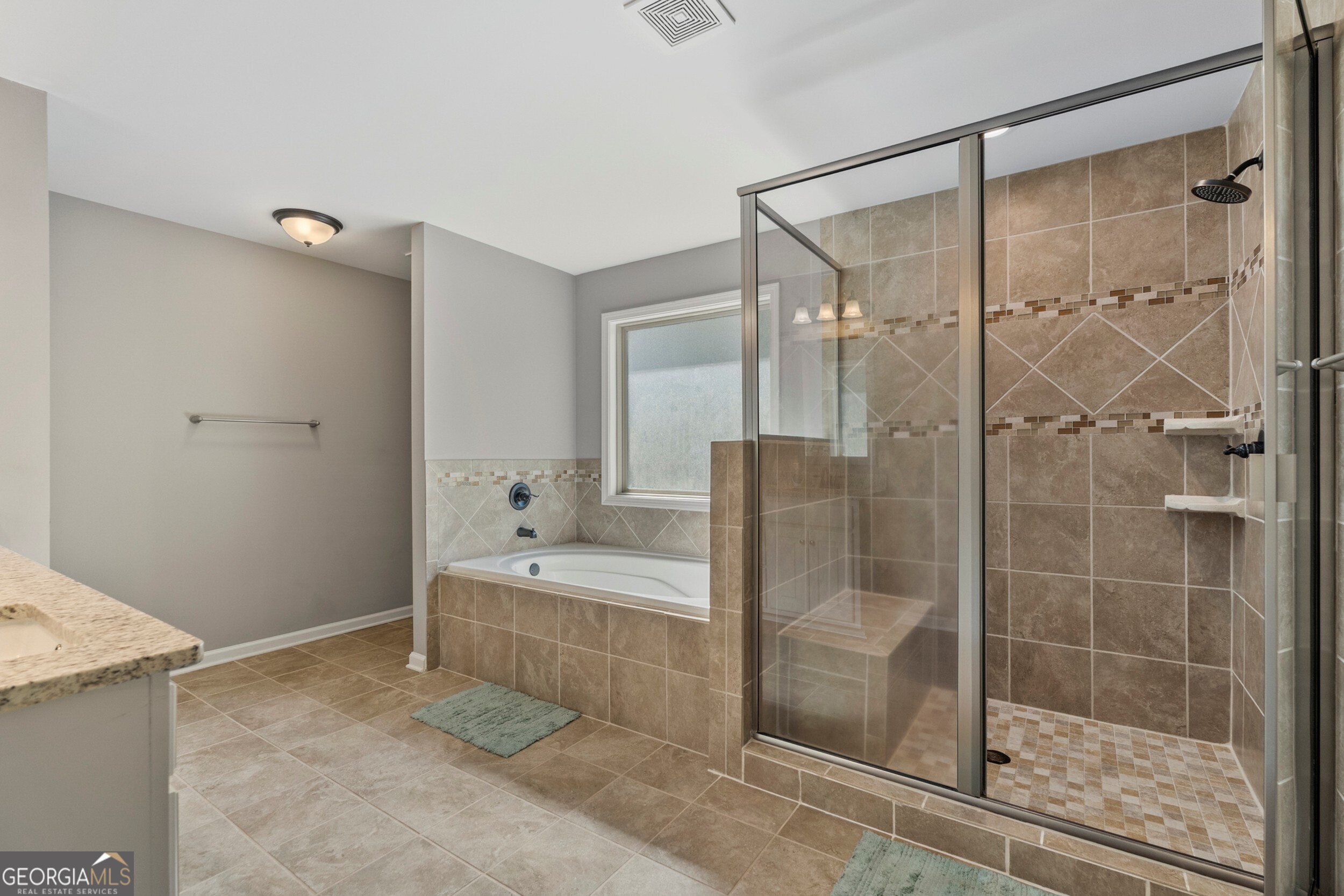 1612 Dennis Smith Road Pine Mountain, GA 31822 - Photo 16 of 33 a bathroom with a shower and a sink