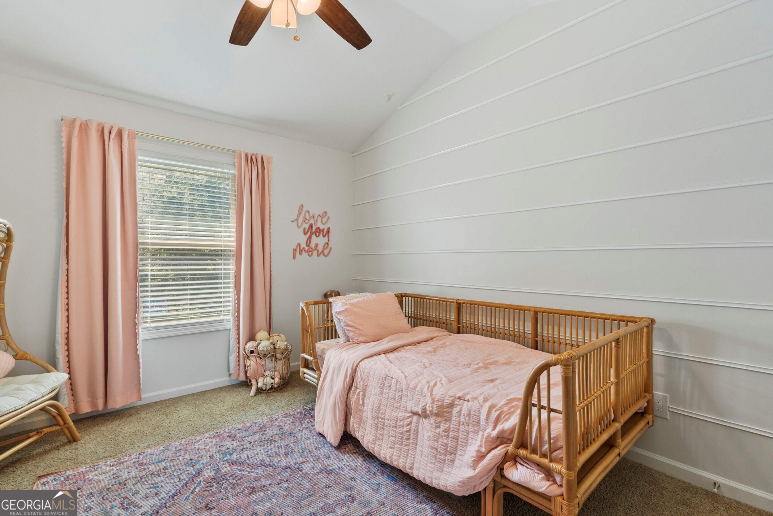 1612 Dennis Smith Road Pine Mountain, GA 31822 - Photo 19 of 33 a bedroom with a bed and a chandelier