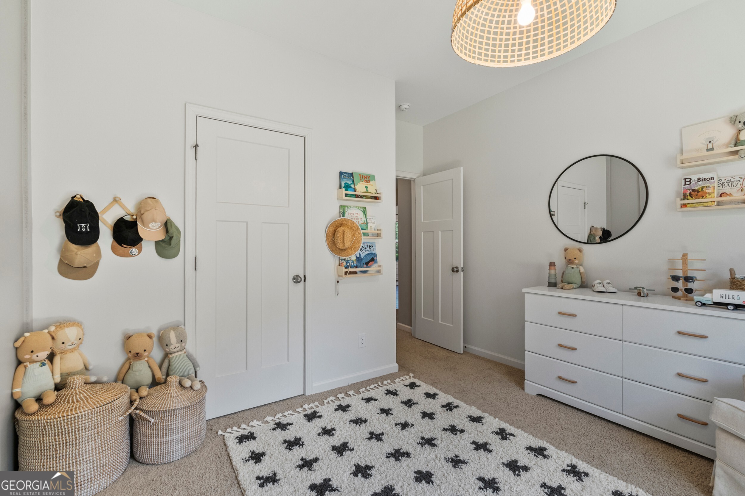 1612 Dennis Smith Road Pine Mountain, GA 31822 - Photo 22 of 33 a room with a baby crib and a mirror