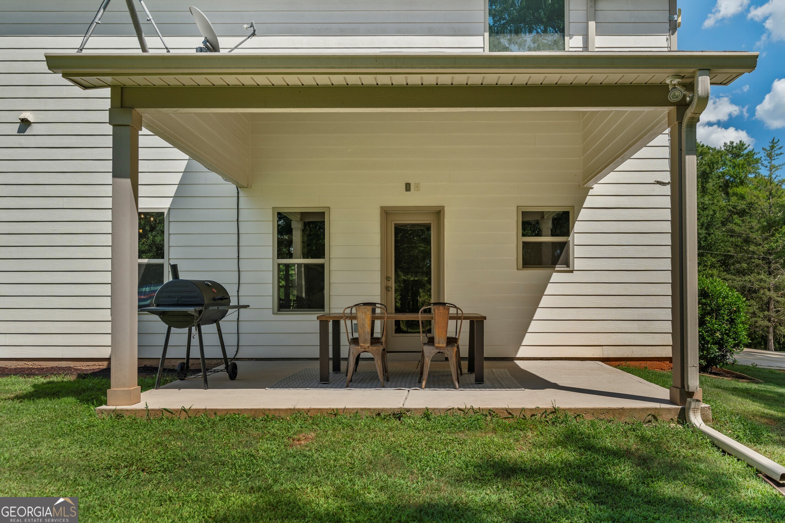 1612 Dennis Smith Road Pine Mountain, GA 31822 - Photo 27 of 33 a view of house with backyard and outdoor seating
