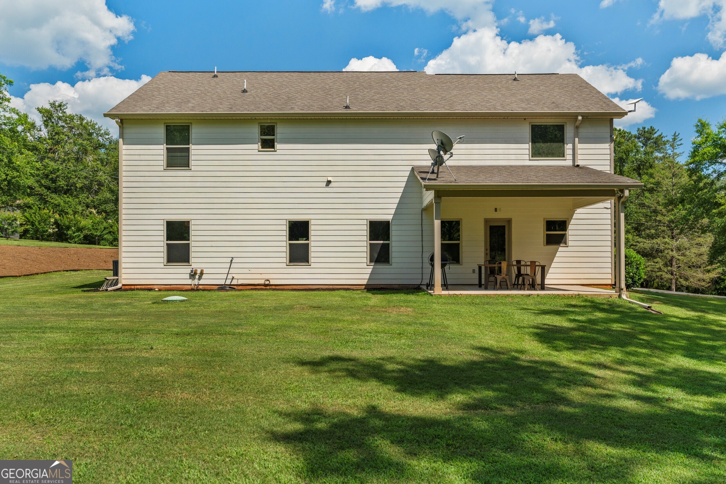 1612 Dennis Smith Road Pine Mountain, GA 31822 - Photo 28 of 33 a front view of a house with a garden