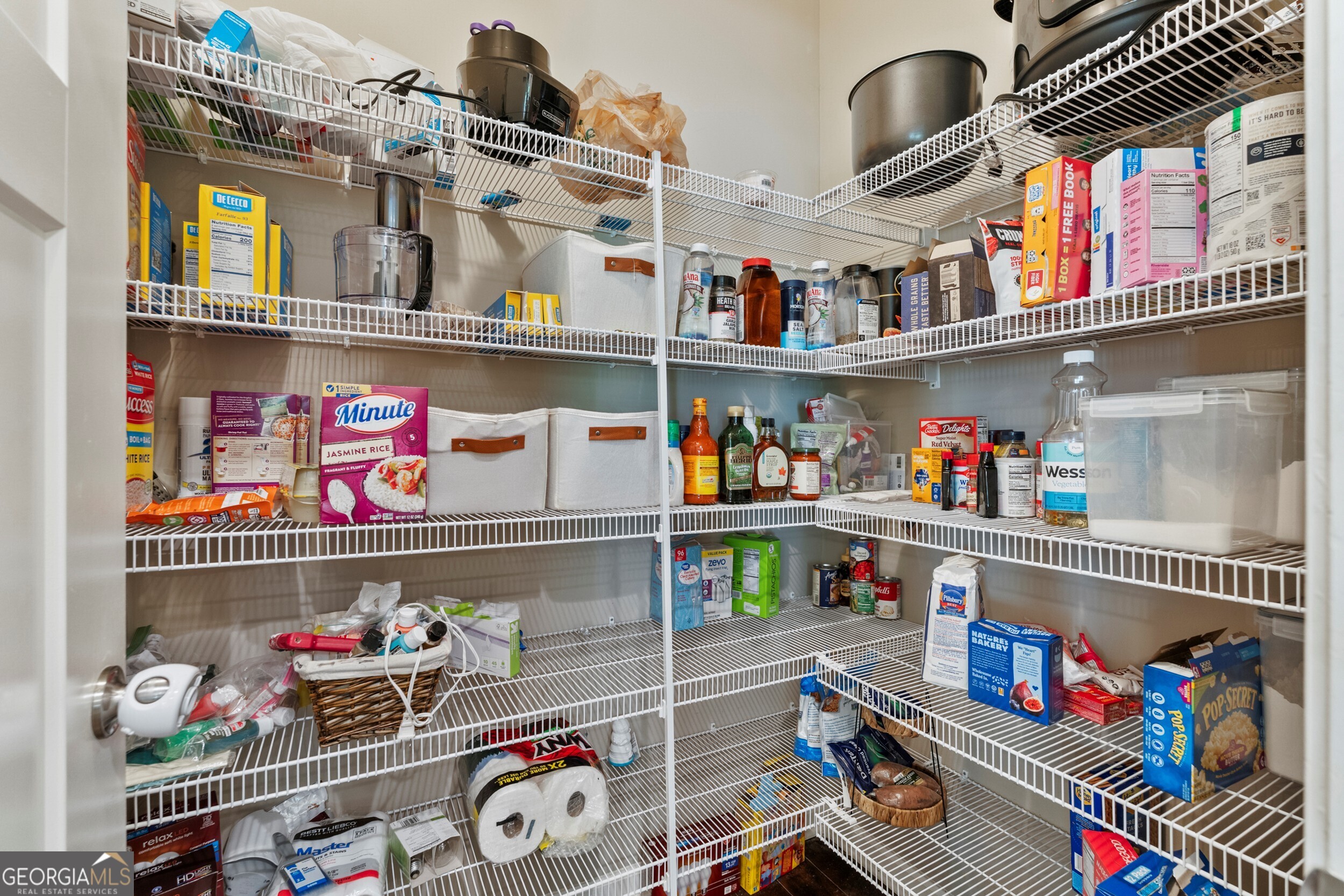 1612 Dennis Smith Road Pine Mountain, GA 31822 - Photo 7 of 33 a store room with lots of clutter and storage