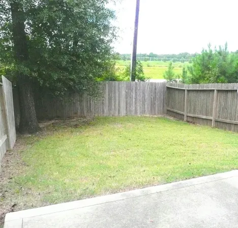 $1,699 | 63 Woodland Hills Drive, Unit 1B, Conroe, TX 77303