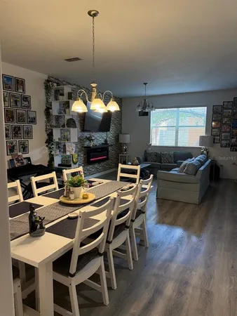 a view of a dining room with furniture