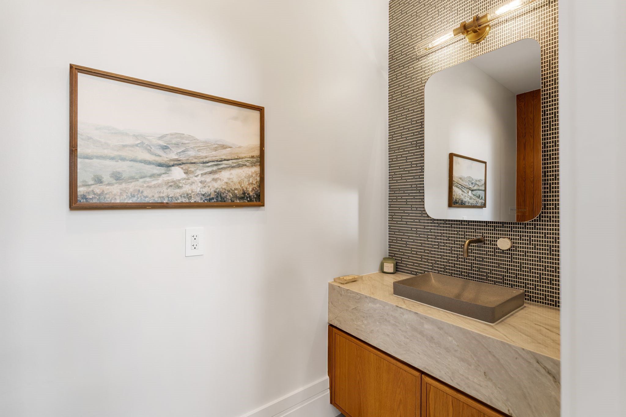 1023 Euclid Street Houston, TX 77009 - Photo 13 of 32 a bathroom with a granite countertop sink and a mirror