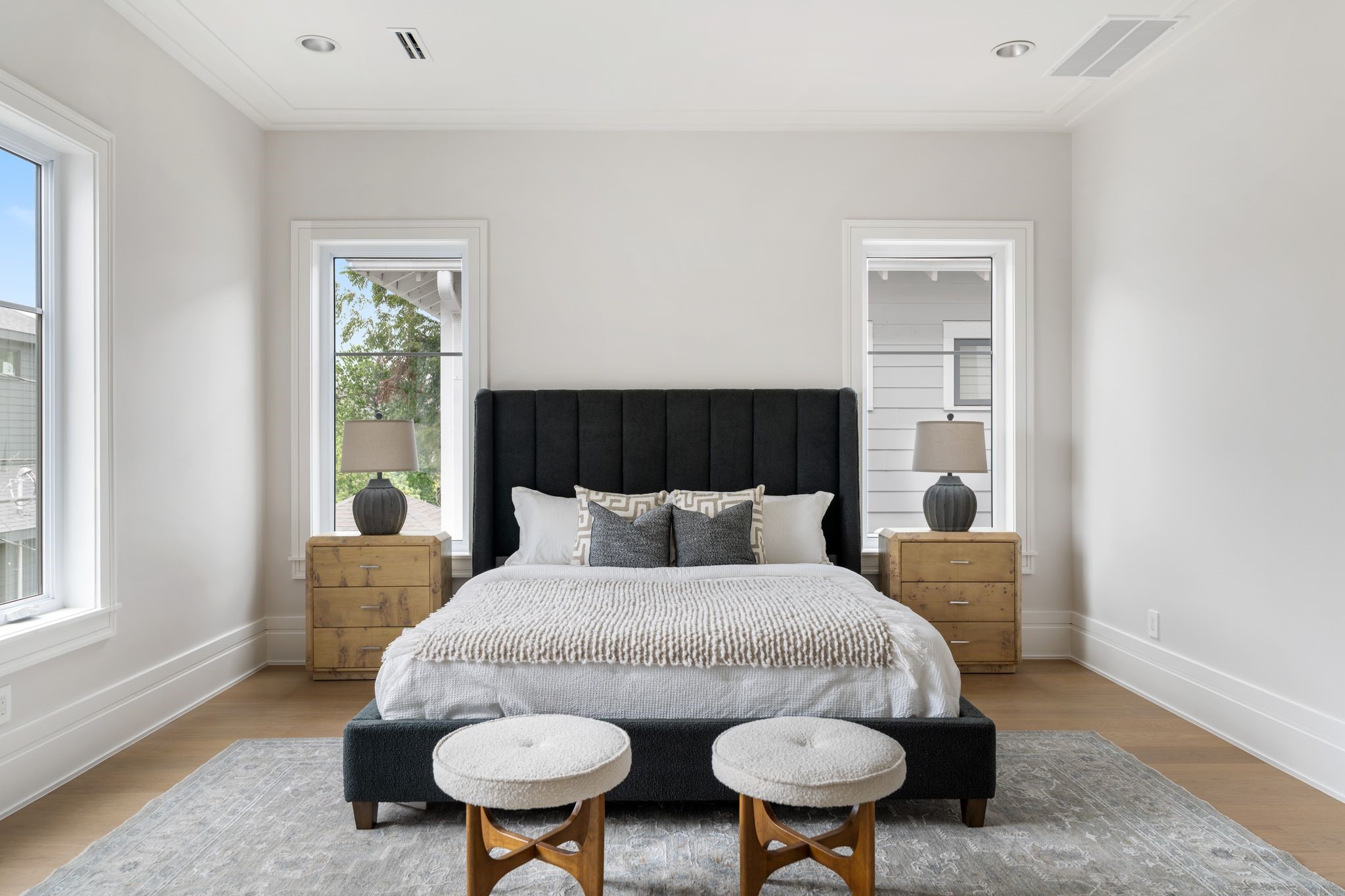 1023 Euclid Street Houston, TX 77009 - Photo 16 of 32 a bed sitting in a bedroom next to a window