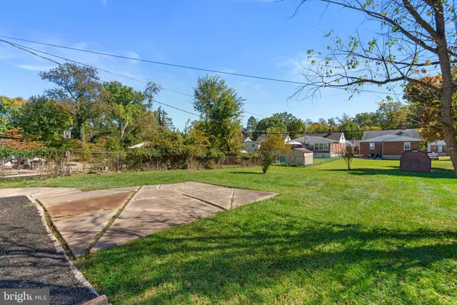 a view of a playground with a yard