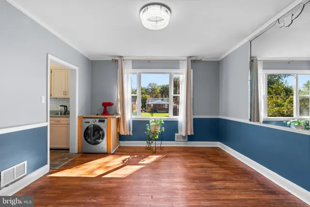 a room with a bed and a window