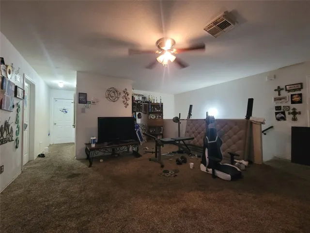 a view of a workspace with furniture