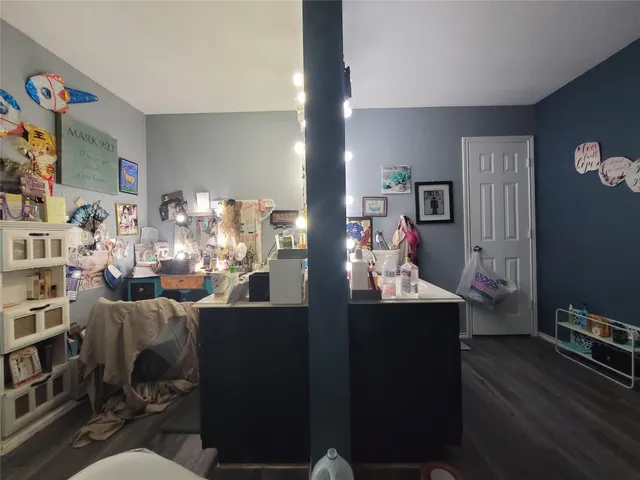 a view of a workspace with furniture