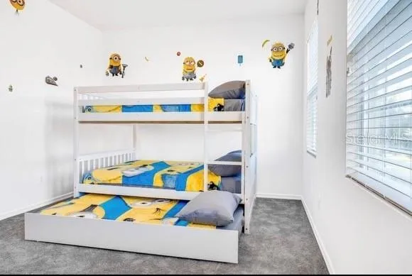 a room with toys and wooden floor