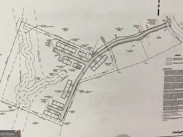 a view of a room with white walls