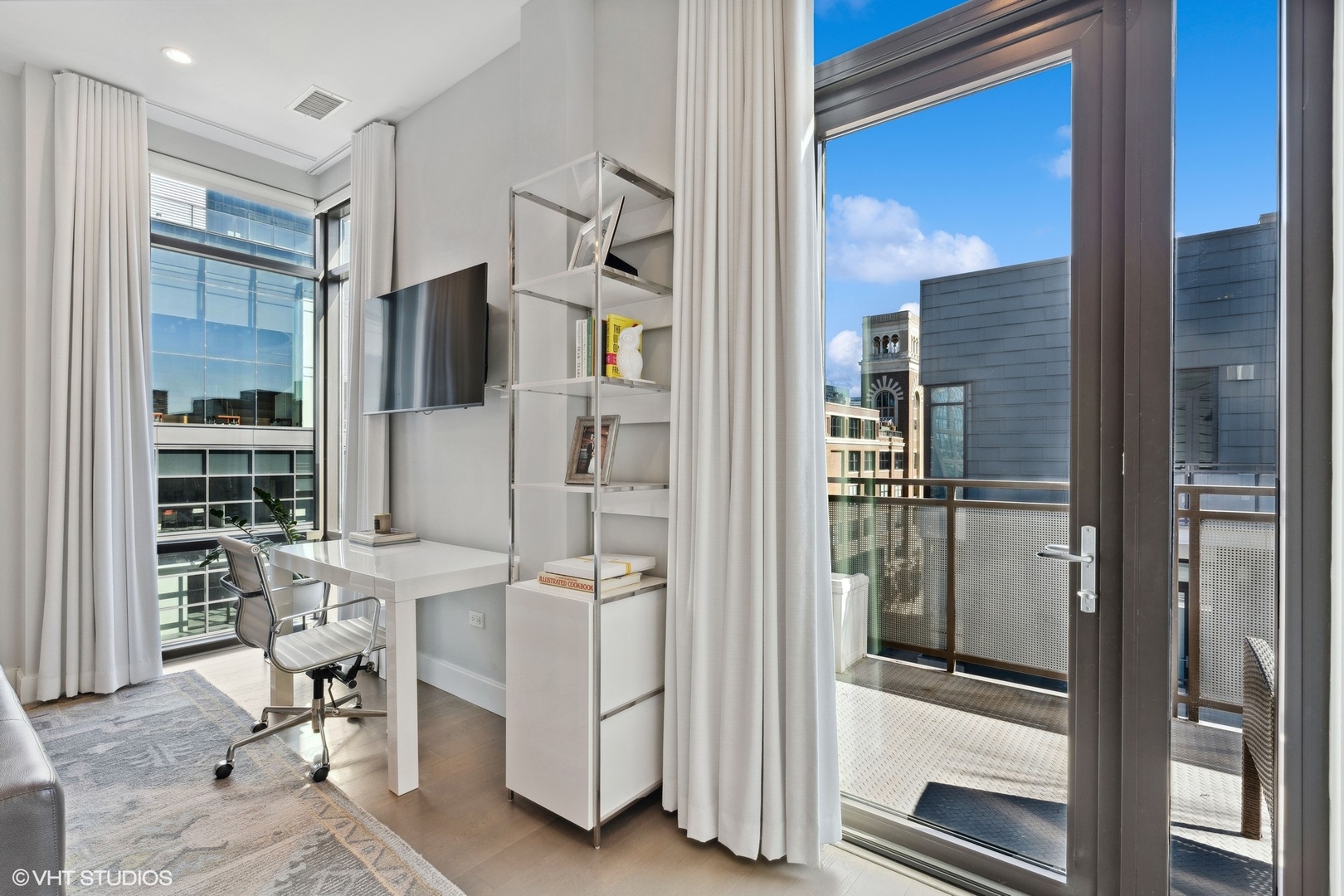 39 North Aberdeen Street, Unit PHN Chicago, IL 60607 - Photo 22 of 46 a view of a hallway with living room and utility room