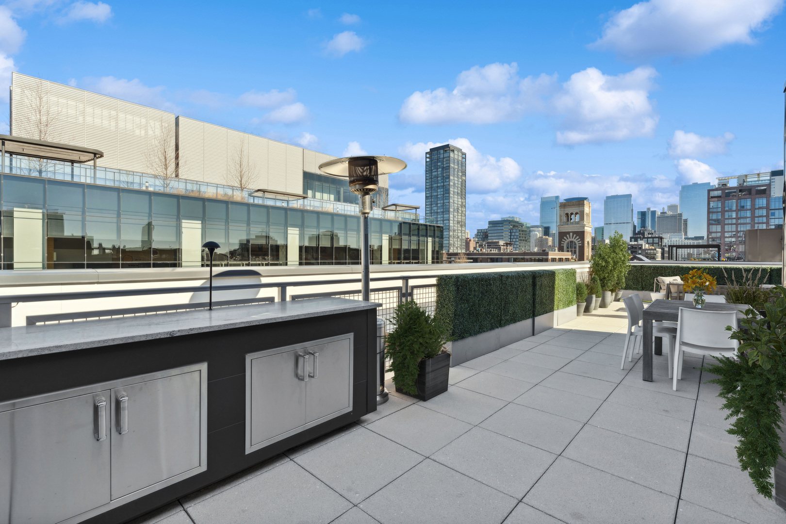 39 North Aberdeen Street, Unit PHN Chicago, IL 60607 - Photo 44 of 46 a view of a city with tall buildings