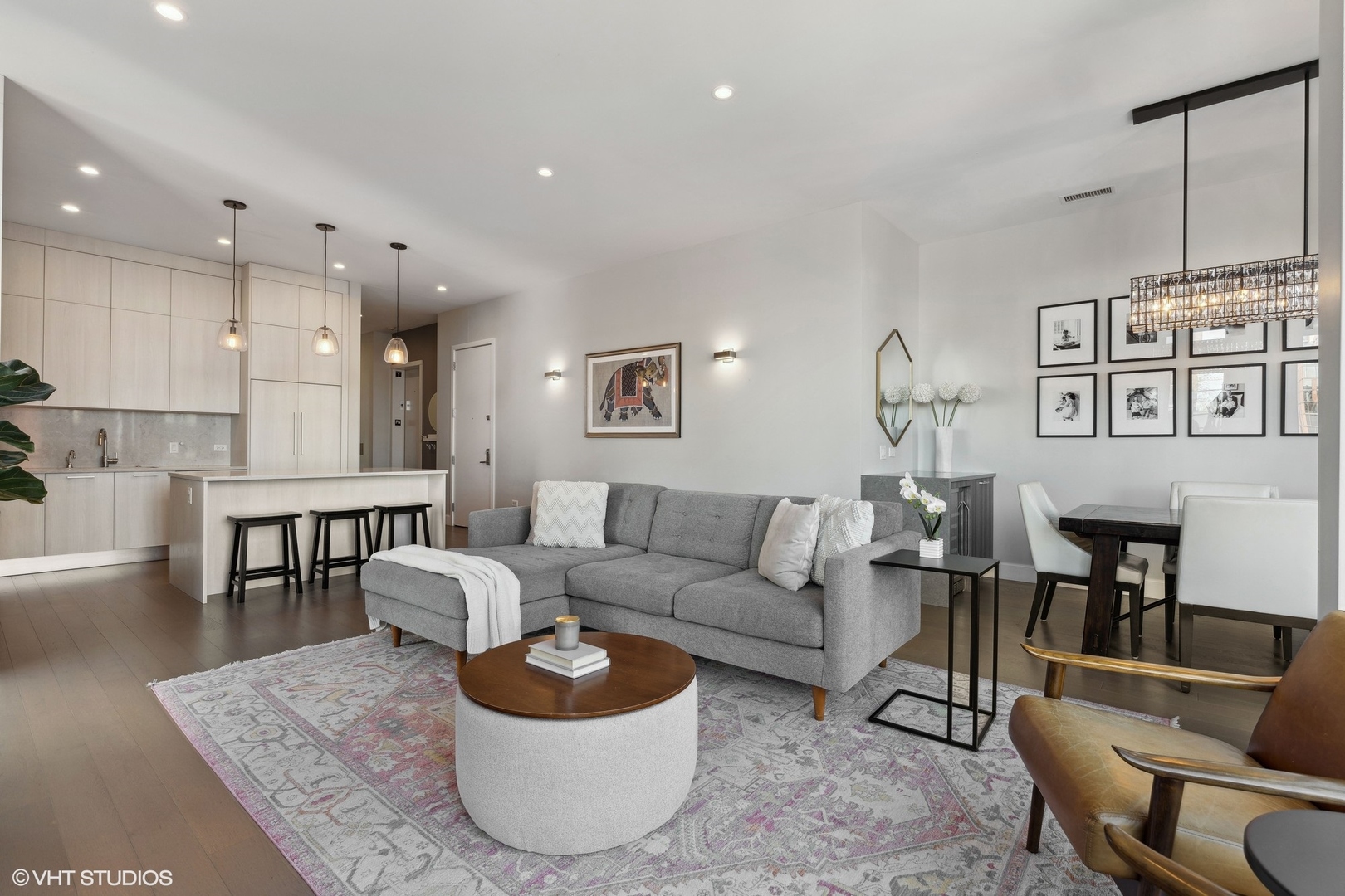 39 North Aberdeen Street, Unit PHN Chicago, IL 60607 - Photo 10 of 46 a living room with furniture and wooden floor
