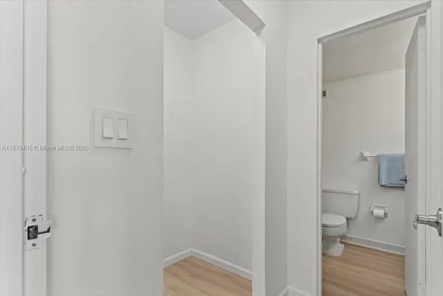 a bathroom with a shower and a shower