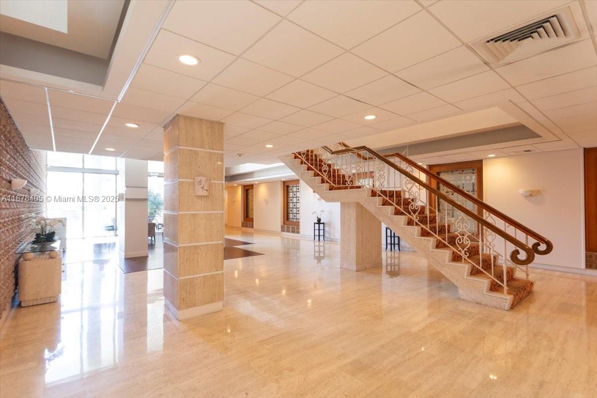 2899 Collins Avenue, Unit 1104 Miami Beach, FL 33140 - Photo 17 of 21 a view of entryway and hall with wooden floor