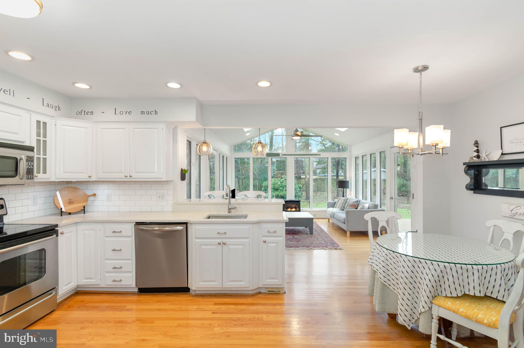 231 Falcon Drive Pasadena, MD 21122 - Photo 11 of 37 Central vacuum with dust pan under cabinet