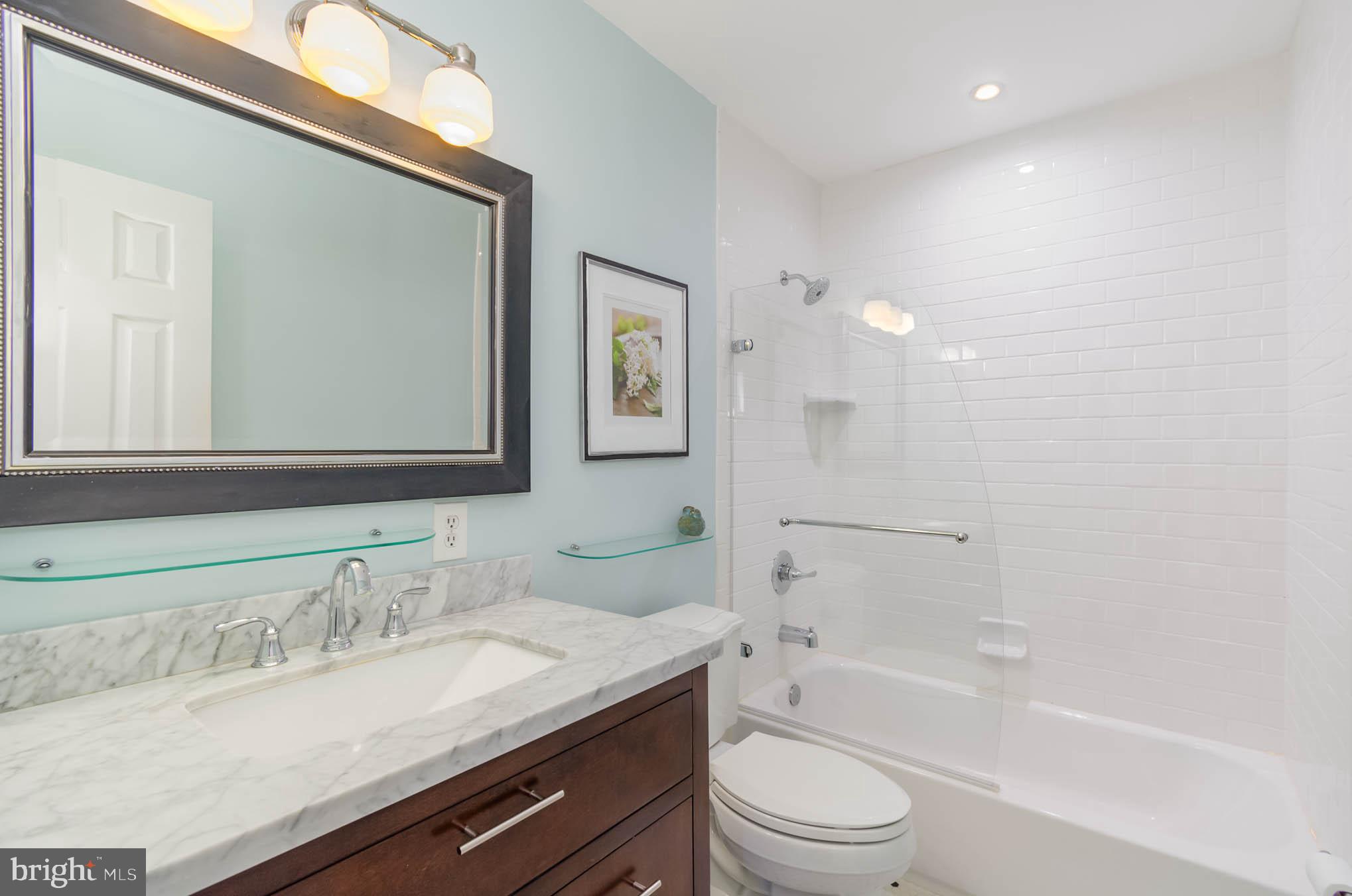 231 Falcon Drive Pasadena, MD 21122 - Photo 22 of 37 Full updated bath in hall