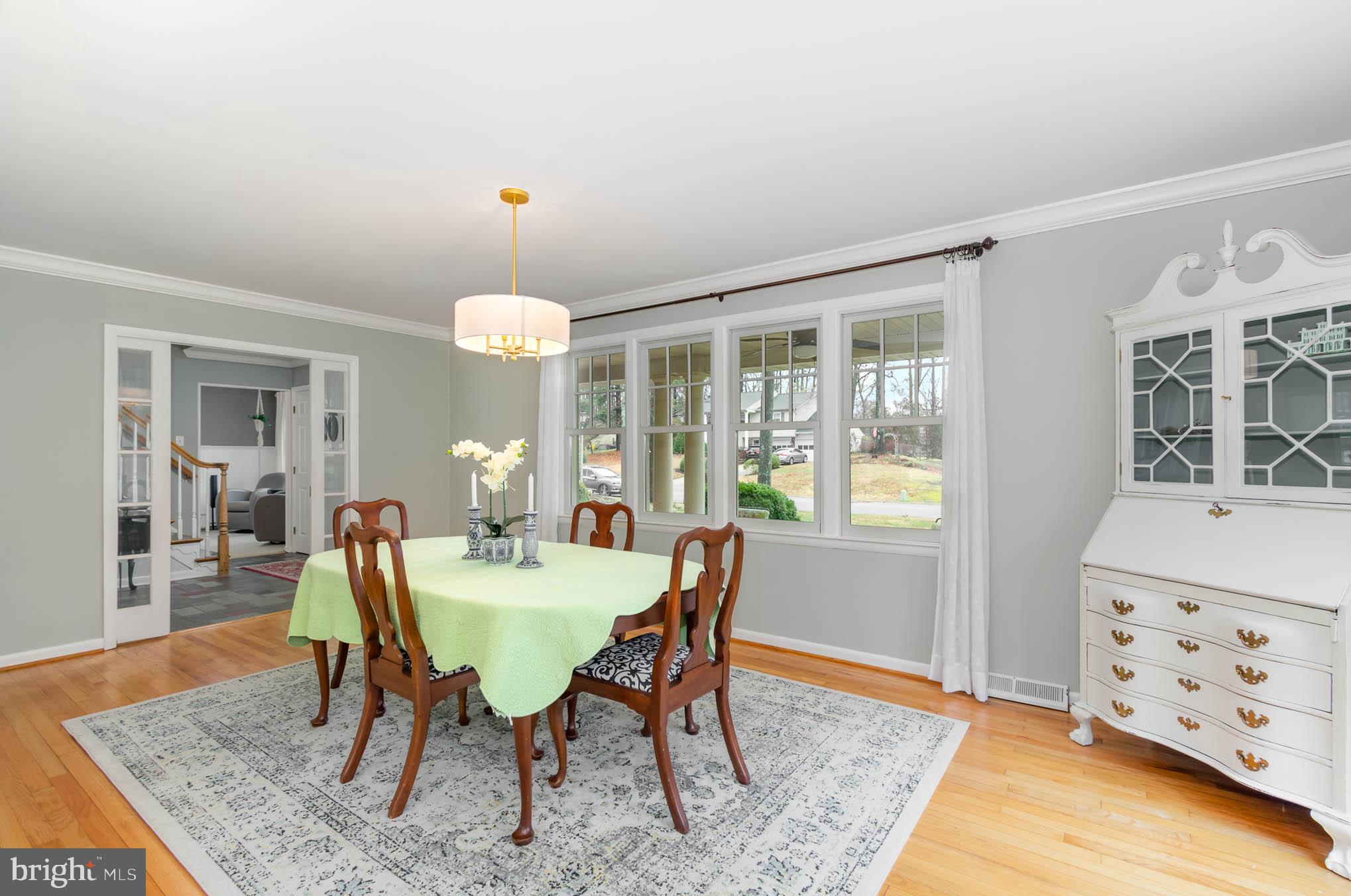 231 Falcon Drive Pasadena, MD 21122 - Photo 6 of 37 Formal dining room with hardwood