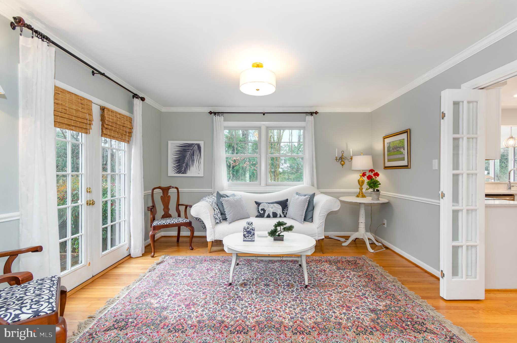 231 Falcon Drive Pasadena, MD 21122 - Photo 8 of 37 Living room with french doors to side patio
