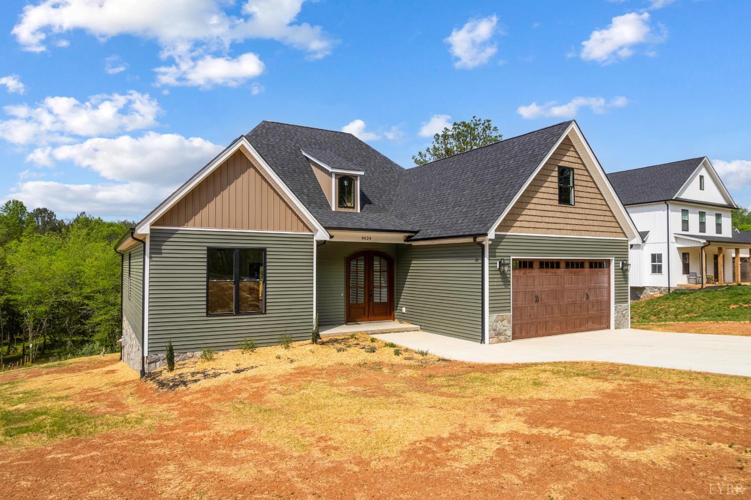 4424 Goode Road Goode, VA 24556 - Photo 2 of 71 a front view of a house with a garage