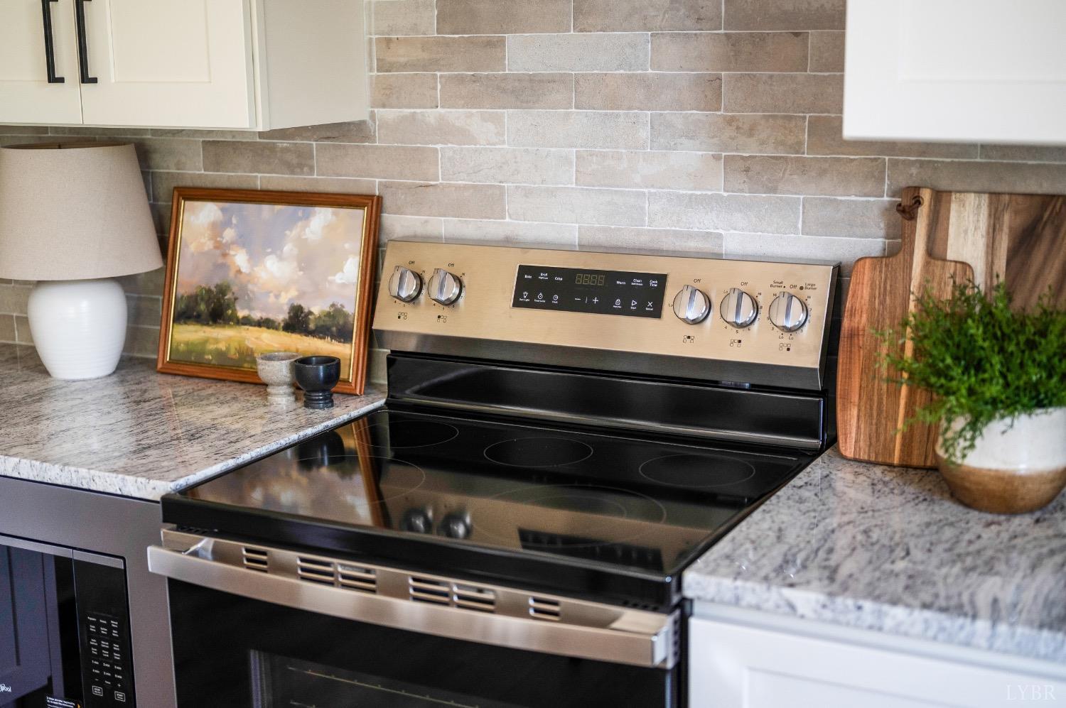 4424 Goode Road Goode, VA 24556 - Photo 25 of 71 a stove top oven sitting inside of a kitchen