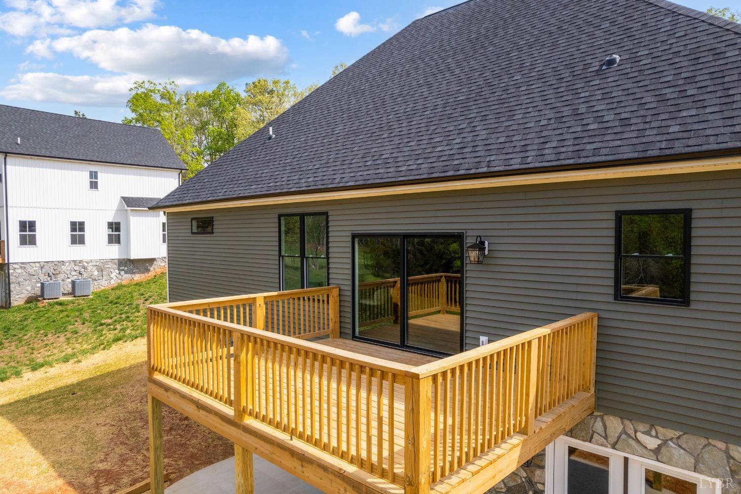 4424 Goode Road Goode, VA 24556 - Photo 64 of 71 a view of house with backyard and outdoor seating