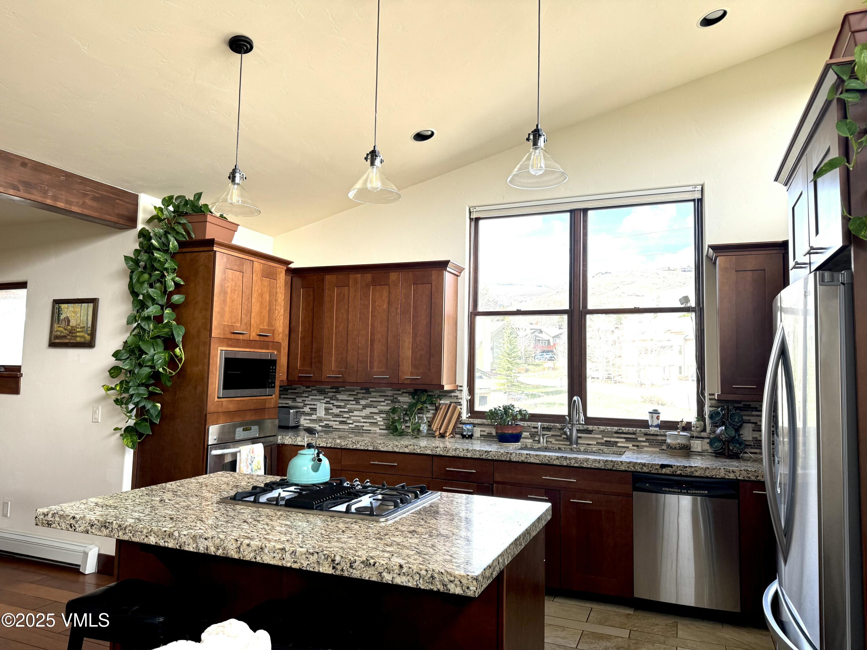 Kitchen with vaulted ceiling